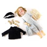An early 20thC SFBJ bisque headed doll, with sleep eyes, open mouth showing teeth, with articulated