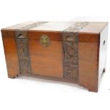An Eastern camphor wood chest, with carved bands of exotic birds, flowering branches, etc., enclosin