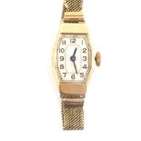 A 9ct gold Art Deco wristwatch, with Arabic numerals, 2cm dial, hand wind movement and meshwork stra