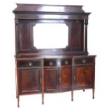 An early 20thC mahogany mirror back sideboard, the top with a moulded cornice above a bevelled plate