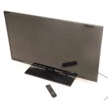 A Panasonic 40" LCD television, with remote and cable.