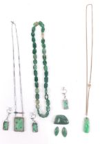 Various jade and jade coloured jewellery, a pendant 3cm high, attached to a slender link necklace, f