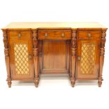 An early Victorian mahogany sideboard, centred by a frieze drawer, with pierced metal mesh work cupb