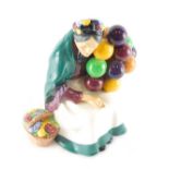 A Royal Doulton figure The Old Balloon Seller, HN1315, printed marks beneath, 17cm high.