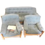 An Ercol Wychwood elm three piece suite, re-upholstered in grey fabric, the sofa 189cm wide. Purch