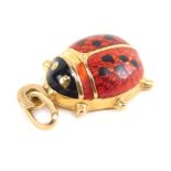 A 9ct gold ladybird charm, with enamelled red and black back, 2cm high, 1g all in.