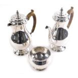 A George VI silver piece coffee service, by CE, comprising coffee pot, with acorn finial, moulded ha