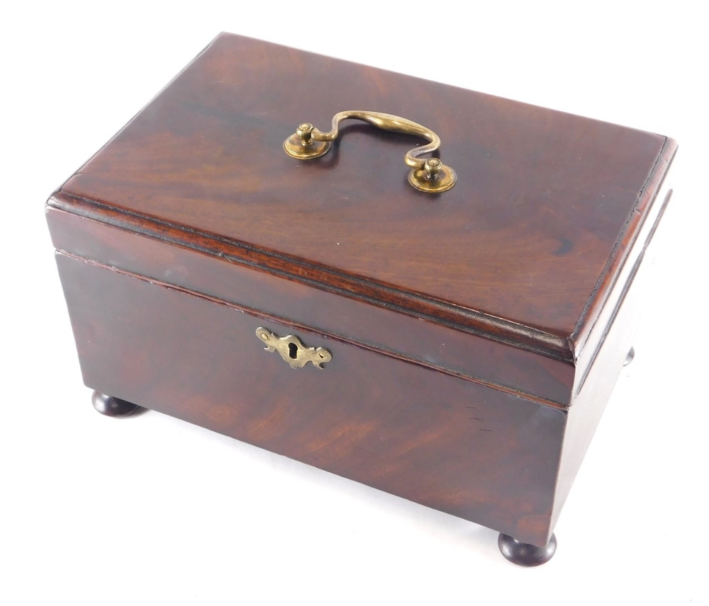 An early 19thC mahogany apothecary box, with brass handle, the hinged lid revealing a fitted interio