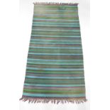 A Kilim rug, with striped design, in turquoise, green, navy, etc., 203cm x 103cm.