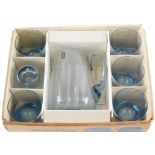A 1970's Whitefriars water set, comprising jug, 18cm high, and six glasses, partially boxed. (labell