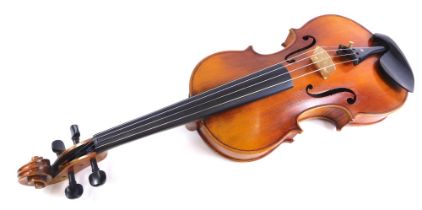 A 20thC violin, with two bows, one stamped P&H London in outer case, two piece back, the case 77cm