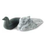 An Inuit Eskimo carving of a duck, 11cm long, labelled beneath, and a Canada Eskimo Art seal. (2)