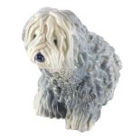 A Beswick Old English sheep dog, number 453 8190, printed and impressed marks beneath, 23cm high.