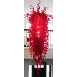 A large and impressive Murano centrepiece chandelier or shade, set with various red glass shaped sec