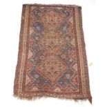 A Shiraz rug, with a central pole medallion in orange, on a blue ground with narrow borders, 153cm x