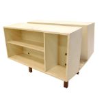 A teak and cream painted retro penguin style donkey bookcase, in the manner of Ernest Rale for Isoko