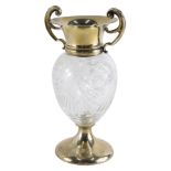 An Edward VII silver and cut glass two handled vase, with scroll handles, shaped body, inverted stem
