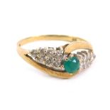 A 9ct gold dress ring, claw set with central green stone flanked by banks of white stones, size O, 2