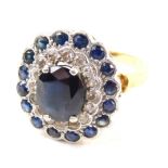 Withdrawn Pre-Sale by Vendor An 18ct diamond and sapphire dress ring, with a stepped floral