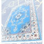 A floral machine woven Turkish style carpet, on a blue ground, 350cm x 253cm.