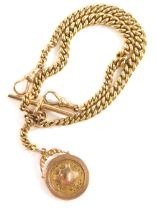 A 9ct rose gold double Albert watch chain, with T-bar centre, marked .375, attached to a vacant shie