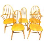 A set of five Ercol style beech and satin birch kitchen chairs, two with arms, each stamped WW.