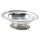 An Edwardian silver basket, by Steinhart & Co, of oval form, partially pierced on oval foot, Birming