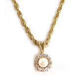 A 9ct gold rope twist necklace, attached to a pendent centred by pearl and surrounded by white stone