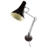 A vintage Anglepoise lamp, with cone shaped shade, articulated stem and circular foot, 67cm high.