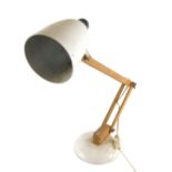 A vintage Anglepoise lamp, with wooden stem and white metal cone shaped shade, on circular foot, 51c
