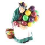 A Royal Doulton figure The Old Balloon Seller, HN1315, printed marks beneath, 19cm high.