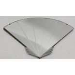 A 1950's fan shaped mirror, with bevel glass and chrome mounts, 52cm x 65cm.