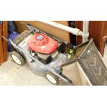 A Honda Easy Start rotar mower with grass box.