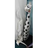 A wooden painted figure of a standing cat, in black spots, 101cm high. and a pair of oriental painte