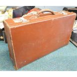 A 20thC brown leather travel case with chrome mounts.