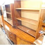 An oak sideboard, and a teak bookcase with sliding doors.