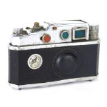 A Japanese novelty camera shaped cigarette lighter, marked made in occupied Japan with chrome mounts