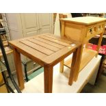 A slatted teak stool, lightwood side cabinet and two drawer desk. (3)
