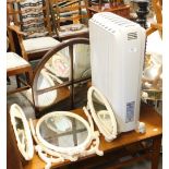 A Delonghi oil filled electric radiator, folding mirror, arched top mirror coffee table. (a quantity