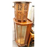 An Eastern hardwood table, a corner walnut display cabinet.