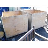 Two wooden crates and pallets.