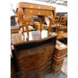 A walnut serpentine fronted chest of five drawers with a recess, on bracket feet, 86c wide, two waln