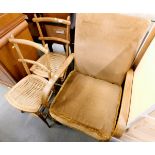 An oak framed armchair and two chairs with rattan seats.