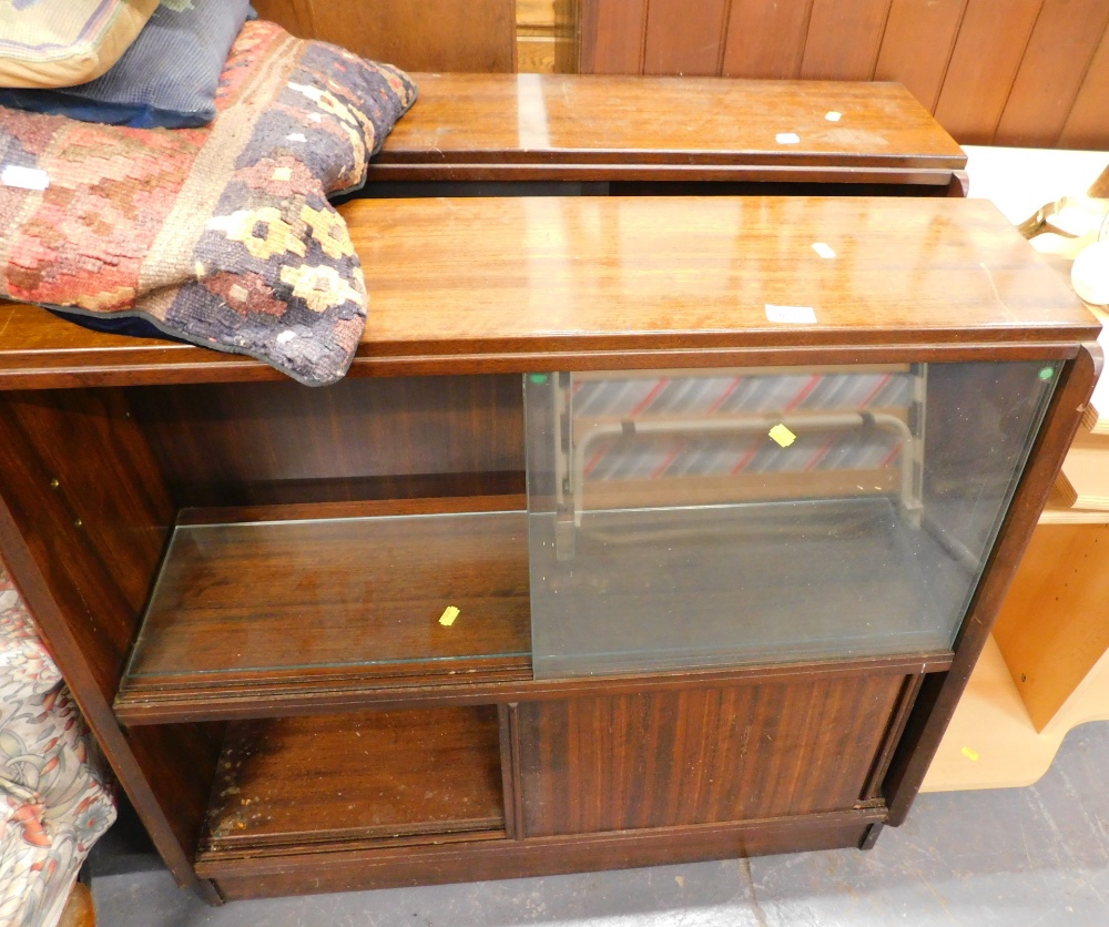 Two similar 1950's/60's mahogany bookcases, each with sliding doors, 93cm wide.