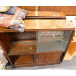 Two similar 1950's/60's mahogany bookcases, each with sliding doors, 93cm wide.