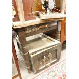 A 19thC stained pine plank top kitchen table, and a pine trunk.