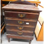 An Edwardian mahogany music cabinet, with four drawers, 48cm wide.