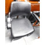 A 1950/60's grey tubular office chair, with black leatherette upholstery. The upholstery in this lot
