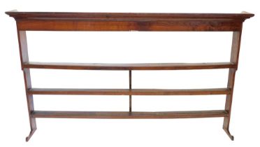 An 18thC oak plate rack, with a moulded cornice above three shelves, 217cm wide, 122cm high. (AF)