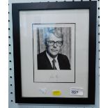 A 1990's photograph of John Major, quarter profile whilst in office as Prime Minister, signed to the